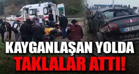 Kayganlaşan yolda taklalar attı 