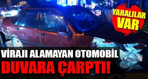 Virajı alamayan otomobil duvara çarptı