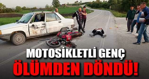 Motosikletli genç ölümden döndü