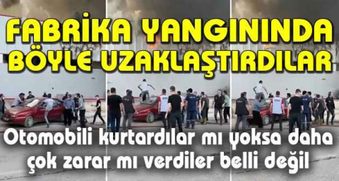 Bursa'daki fabrika yangınında otomobili böyle uzaklaştırdılar