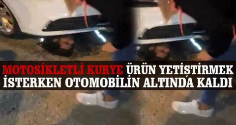 Bursa'da motosikletli kuryenin otomobilin altında can pazarı...