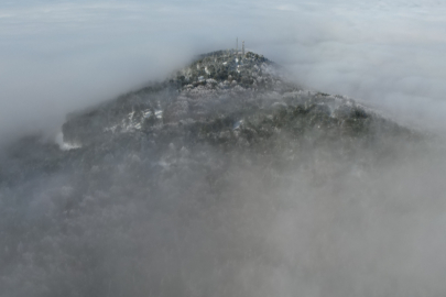 Uludağ’da bulutların ve sisin efsane dansı, masalsı görüntüler oluşturdu