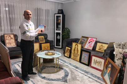 Güvenlik görevlisi çatı katını sanat atölyesine çevirdi