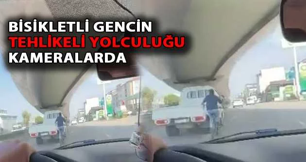 Bursa'da bisikletli gencin tehlikeli yolculuğu kameralarda