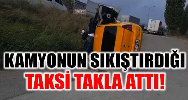 Bursa'da kamyonun sıkıştırdığı taksi takla attı: 2 yaralı